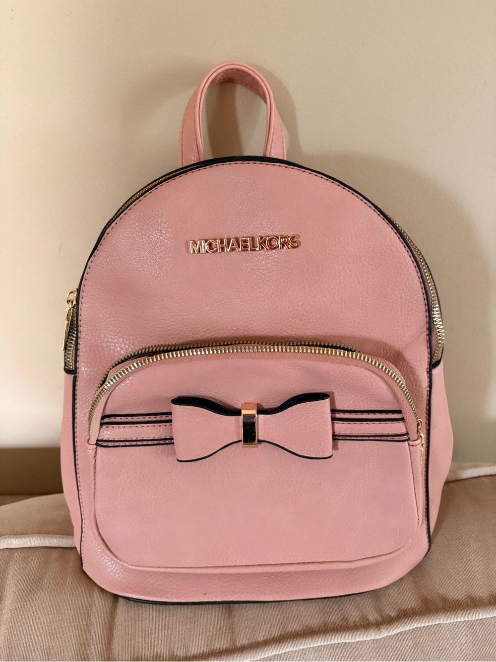 Michael Kors Blush Pink Bow Mini Backpack with Gold Hardware